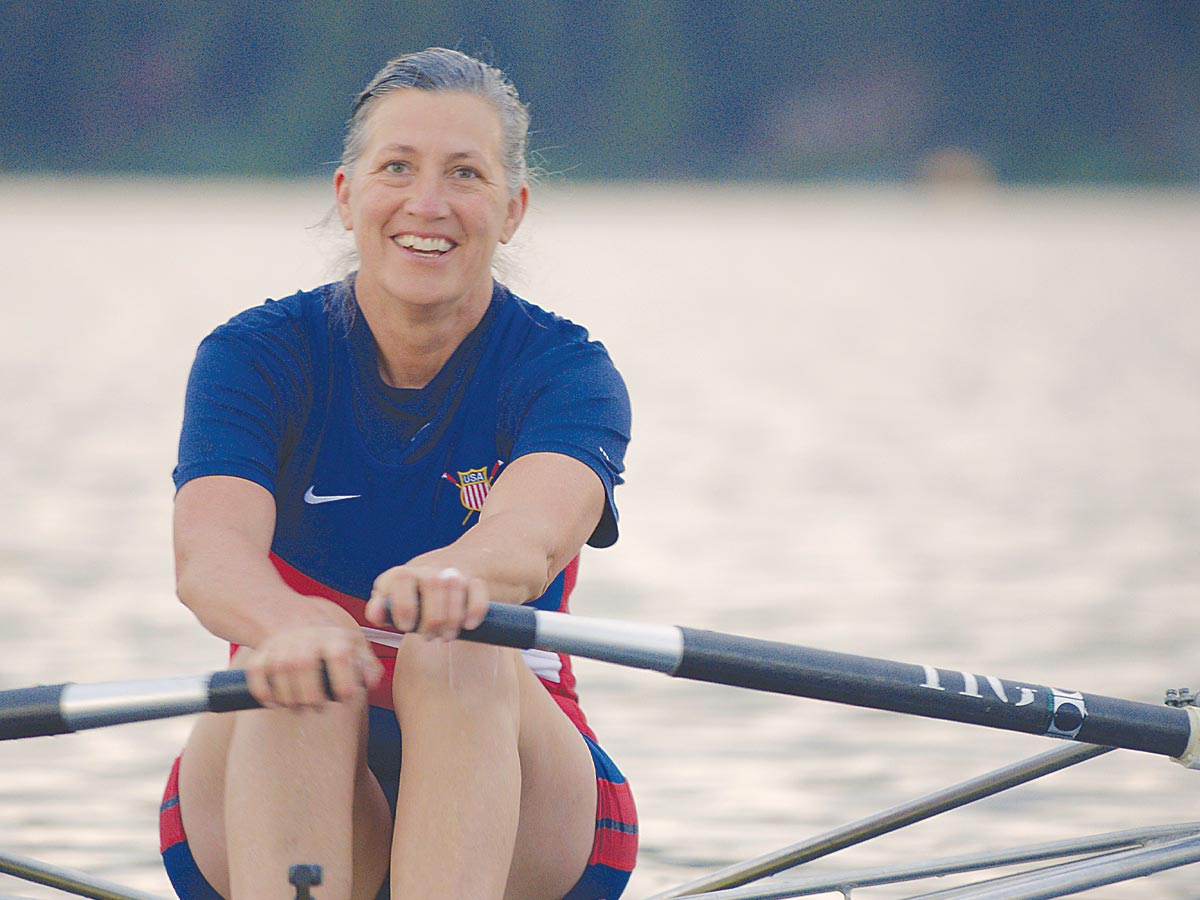 Former Olympian Monica Tranel Rowing on a Lake