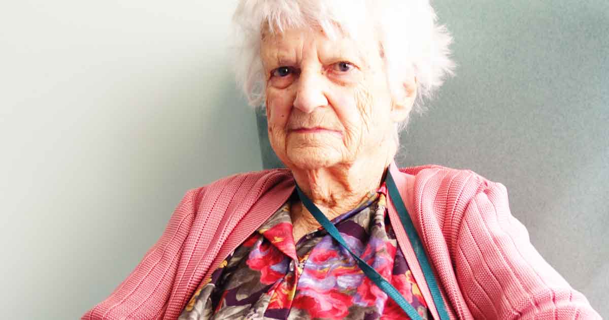 Photo of a senior woman, representing the concept of being a elder orphan