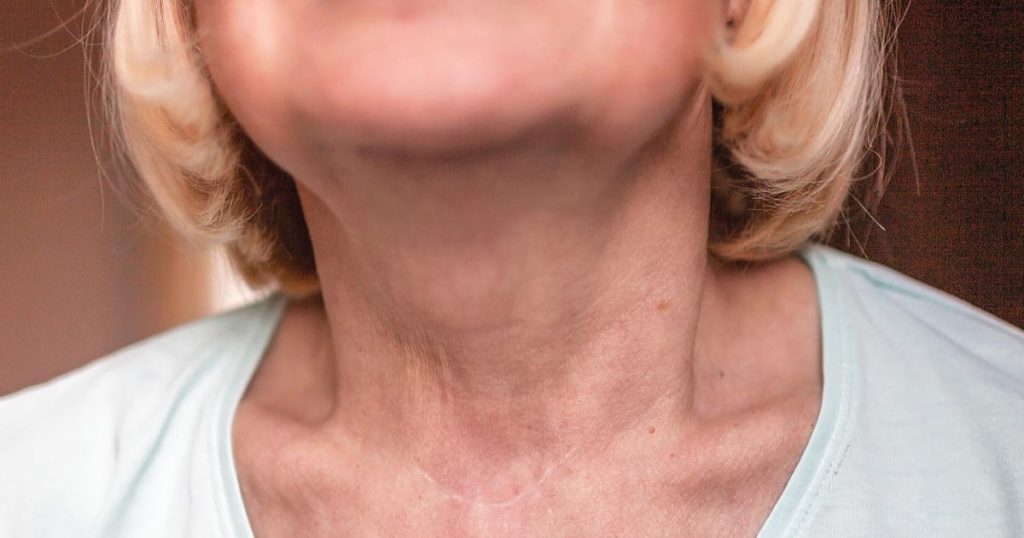 closeup photo of a woman's neck