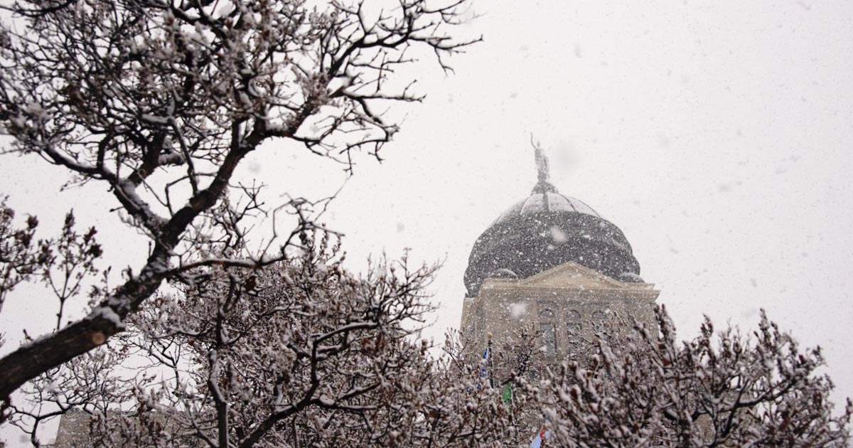 photo of the Montana Capitol in Helena during a blizzard