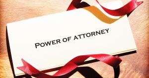 Card that reads "Power of Attorney" for an article about planning ahead for a durable power of attorney