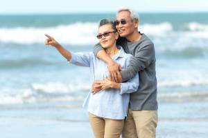 Asian couple on the beach