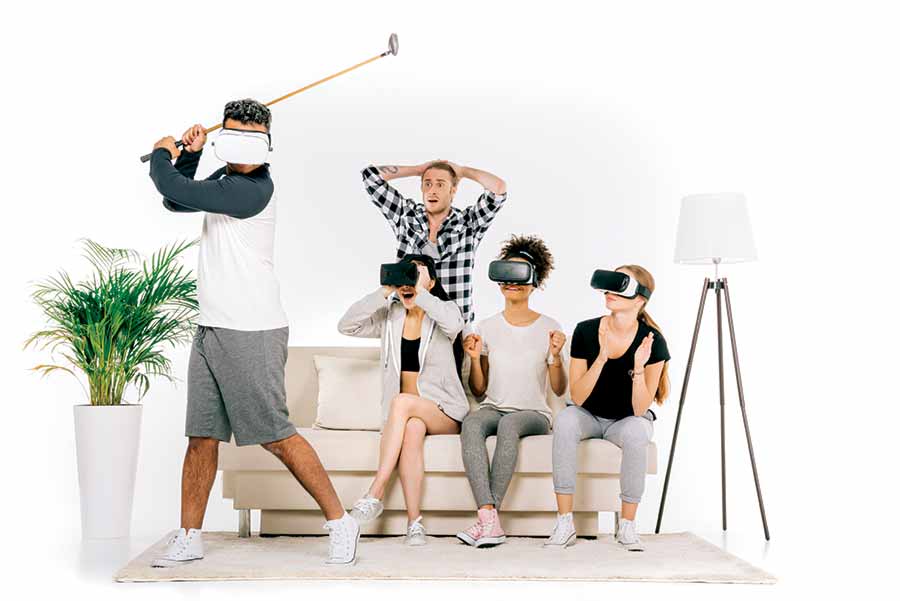 Family playing golf in VR.