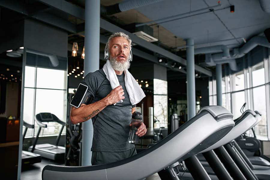 Senior man on treadmill