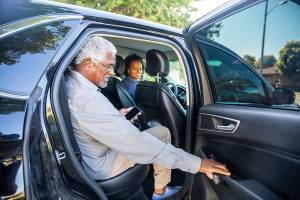 Senior man getting a ride