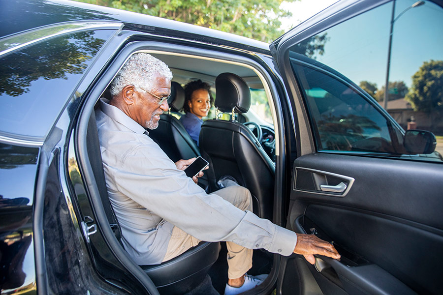 Senior man getting a ride
