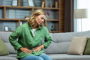 Woman with stomach pain.